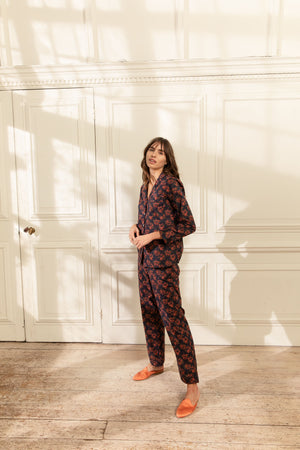 Model wearing classic cotton pyjamas in Mimosa